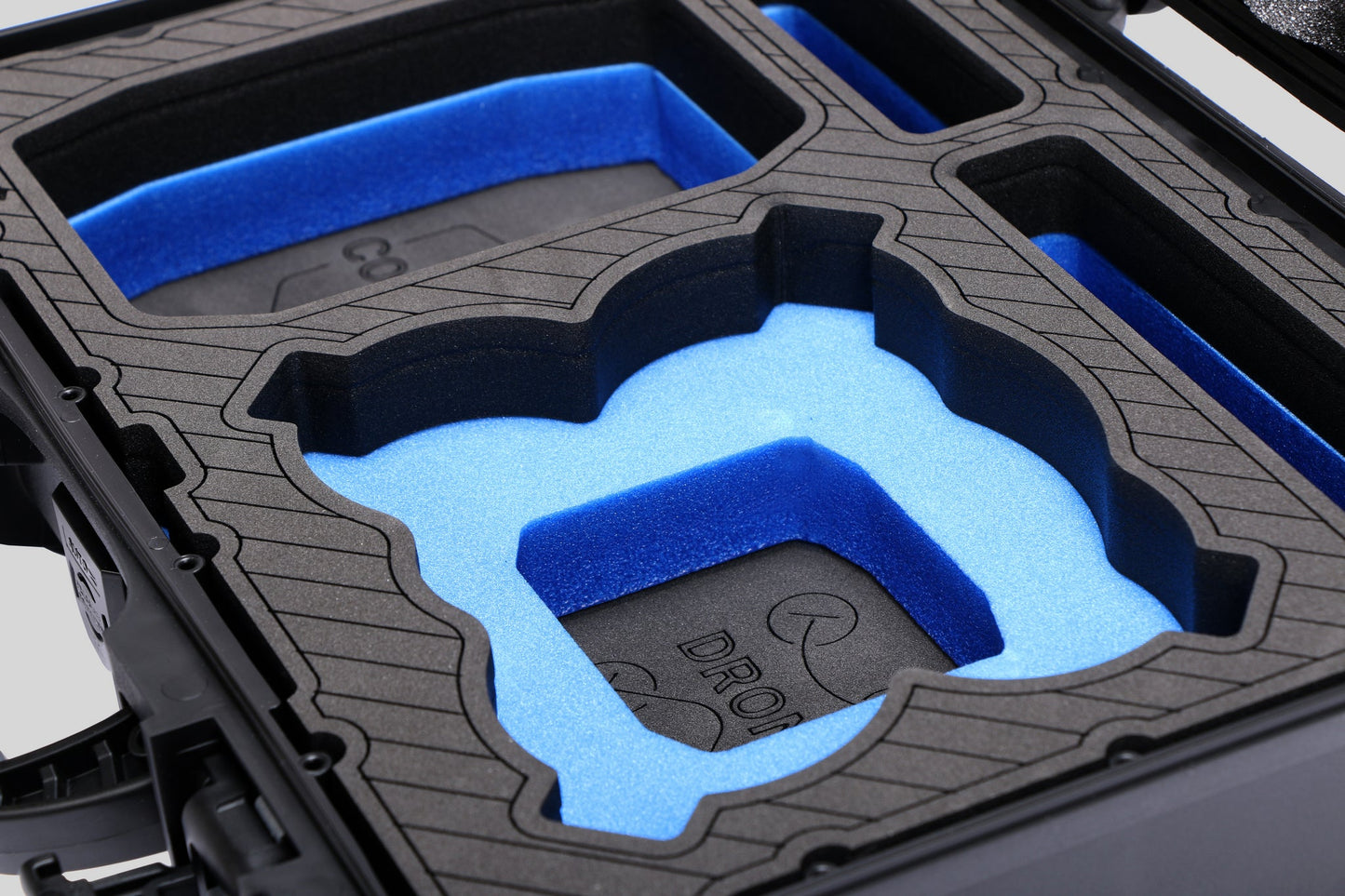 Close-up-view-1 of Foama Black Color All-Weather Carry-on Case and Custom Foam Insert with a Blue Layer for DJI Neo