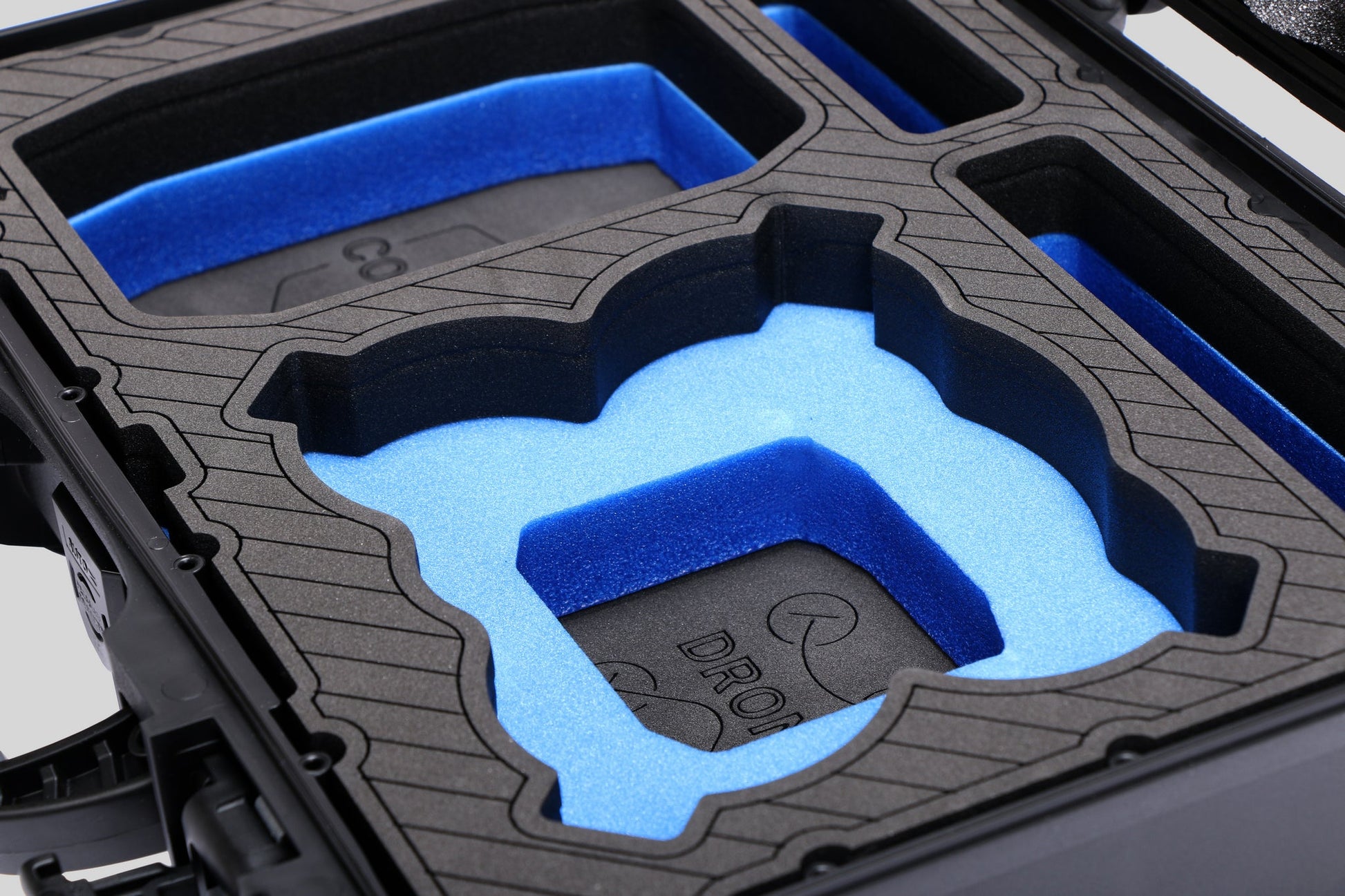 Close-up-view-1 of Foama Black Color All-Weather Carry-on Case and Custom Foam Insert with a Blue Layer for DJI Neo