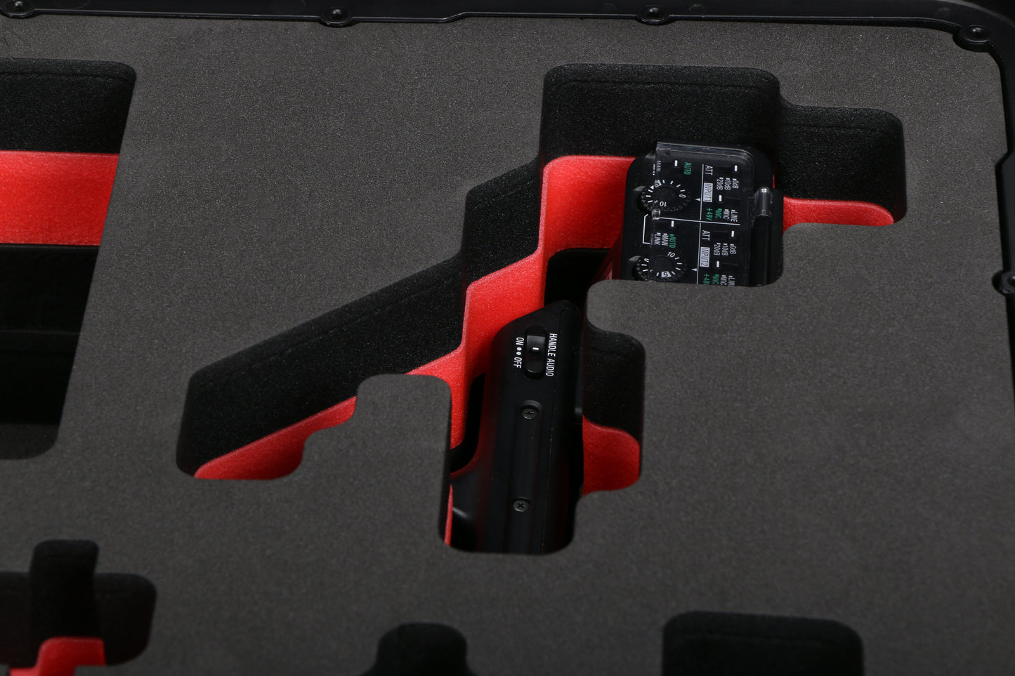 Close-up view 1 of Sony FX3 and accessories in Black Color Studio Case and Custom Foam Insert with a red layer