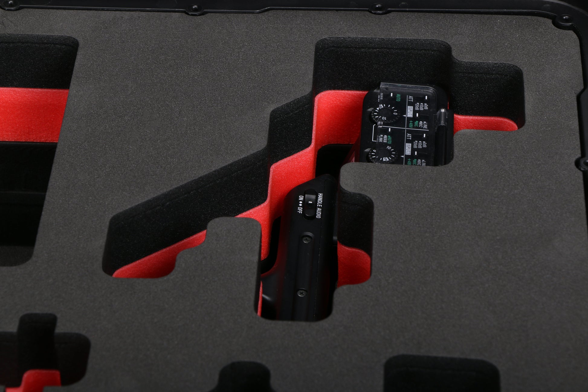 Close-up view 1 of Sony FX3 and accessories in Black Color Studio Case and Custom Foam Insert with a red layer