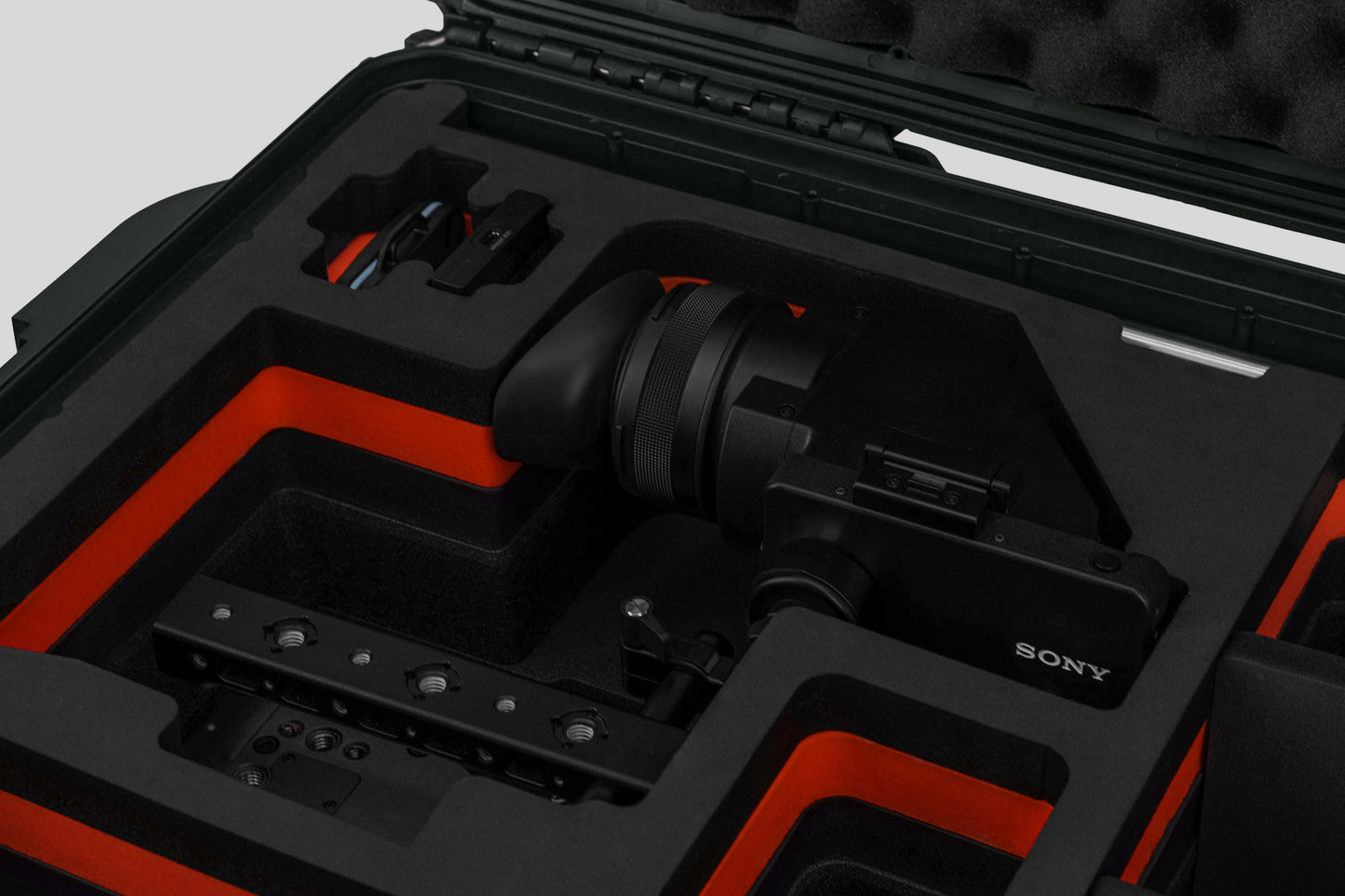Close view of Olive Color Sony Burano Heavy Duty Roller Case and Custom Foam Insert with Red Layer for Burano Camera And Accessories