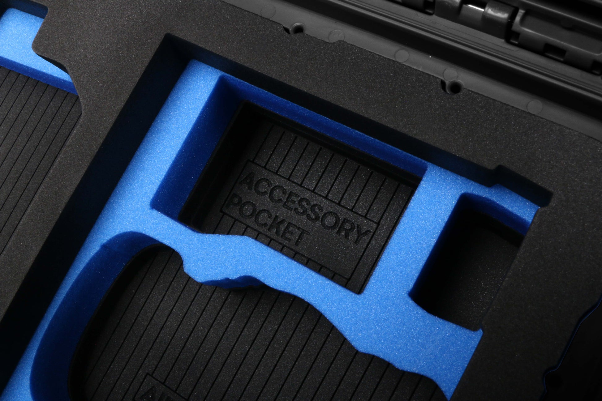 Close-up View 2 of a DJI Mini 3 & 4 Pro Black Color Hard Case with Custom Blue Foam Insert