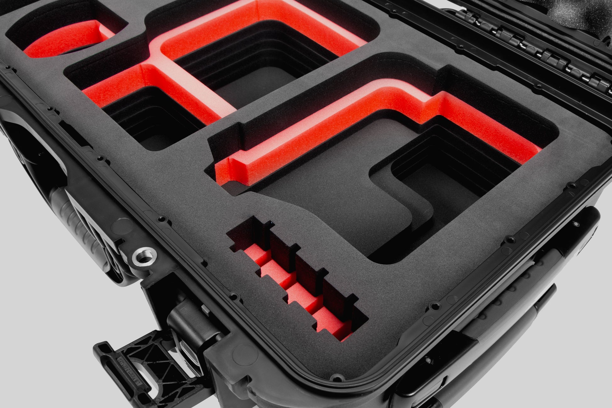Close view of Black Color Canon C400 Camera Carry-on Case and Red Layer Custom Foam Insert