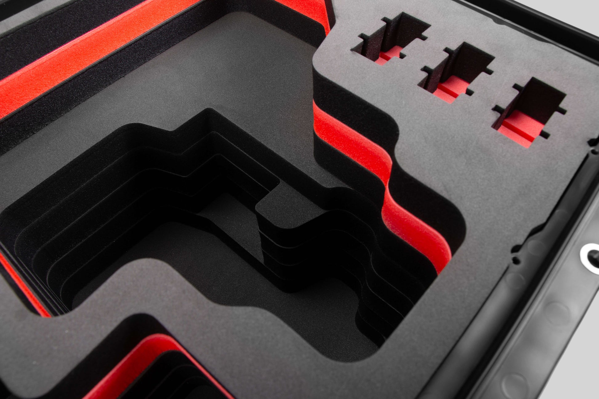 Close view of Black Color Canon C400 Studio Case and Red Layer Custom Foam Insert